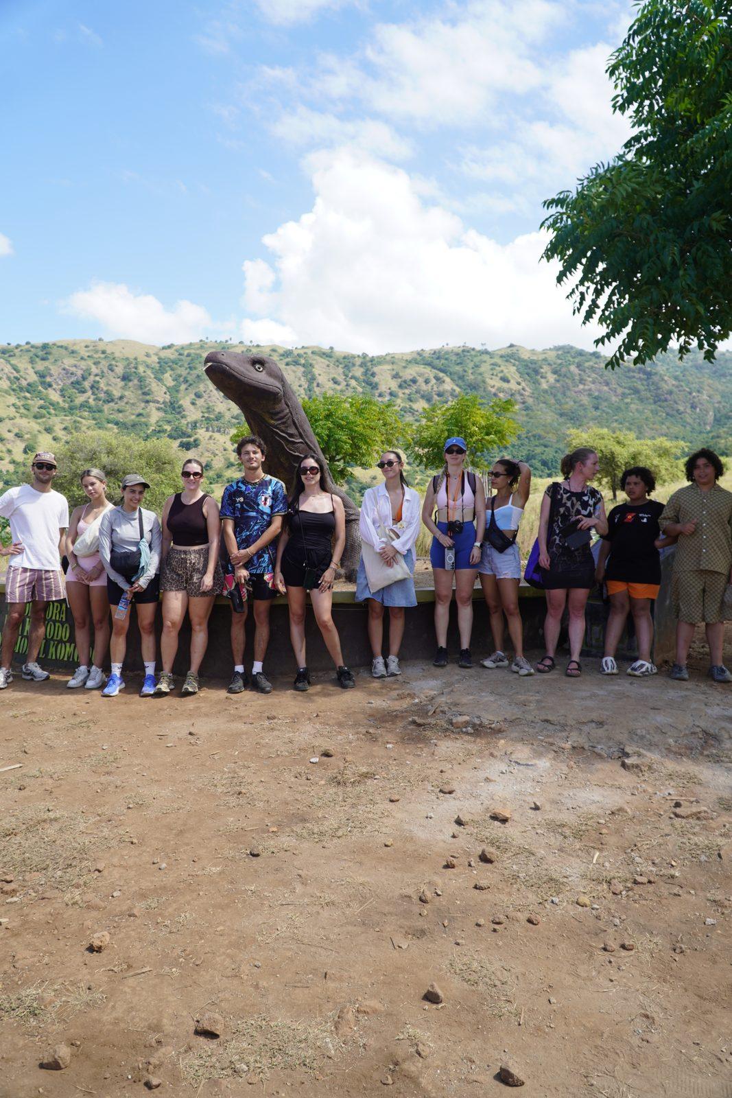 Komodo – group standing on savanna, dry hills (Real photo from a Komodo Explorer trip)