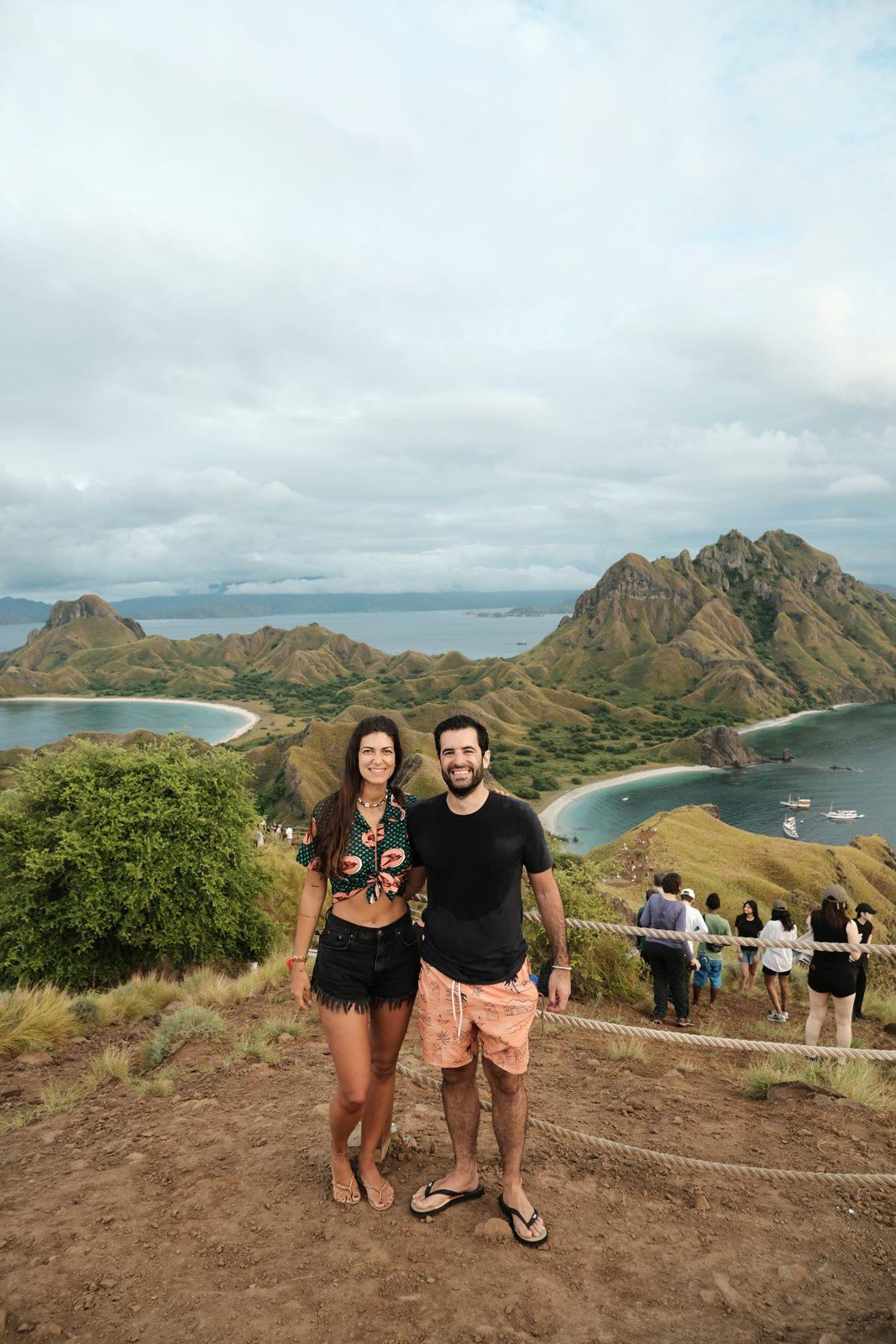 Padar – Couple posing, Padar bays, crowd on ridge (Real photo from a Komodo Explorer trip)