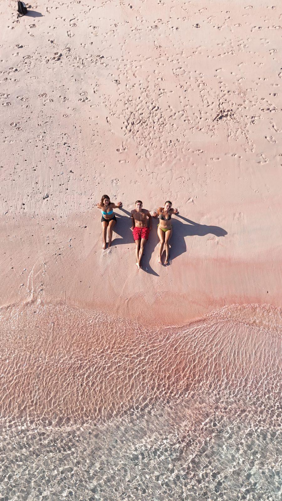 Pink Beach – four people on pink sand, drone (Real photo from a Komodo Explorer trip)
